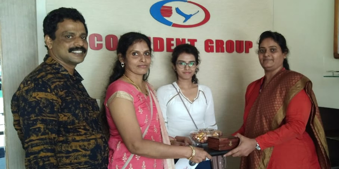 Mrs. Minikumari receiving the keys- Confident Avior, Trivandrum